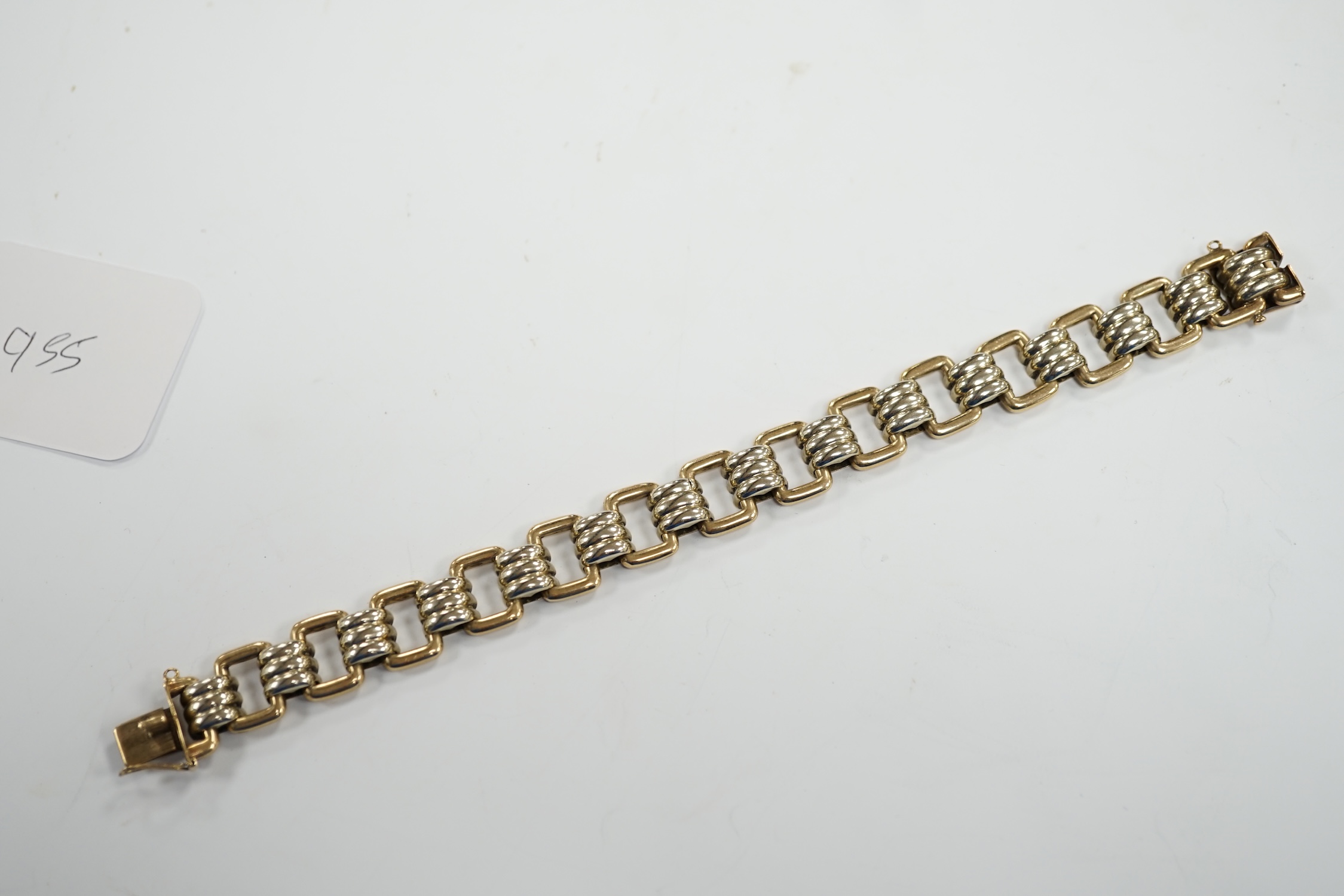 A two colour 9ct gold bracelet, 20cm